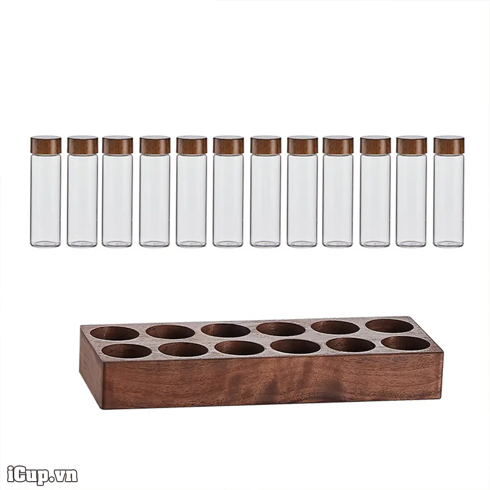Bộ sản phẩm gồn 12 lọ thủy tinh và 1 khay gỗ óc chó khoét lỗ sẵn Bộ sản phẩm gồn 12 lọ thủy tinh và 1 khay gỗ óc chó khoét lỗ sẵn